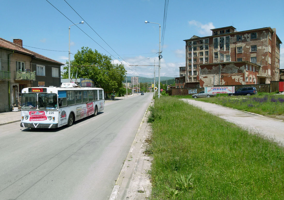 A trolleybus next to abandoned Pektin factory.